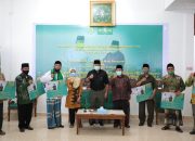 Pembina Kepengurusan (LAZISNU) Sumsel Bagikan Beras untuk Warga NU